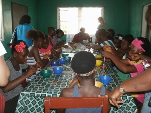 Girls making jewelry